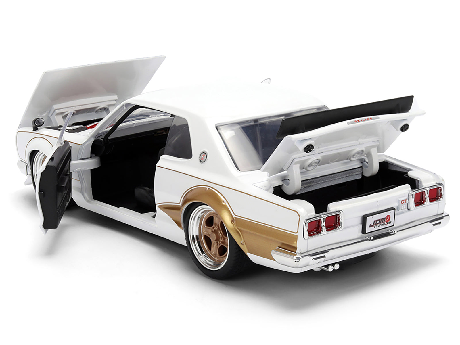 1971 Nissan Skyline 2000GT-R RHD (Right Hand Drive) White with Gold Graphics "JDM Tuners" Series 1/24 Diecast Model Car by Jada