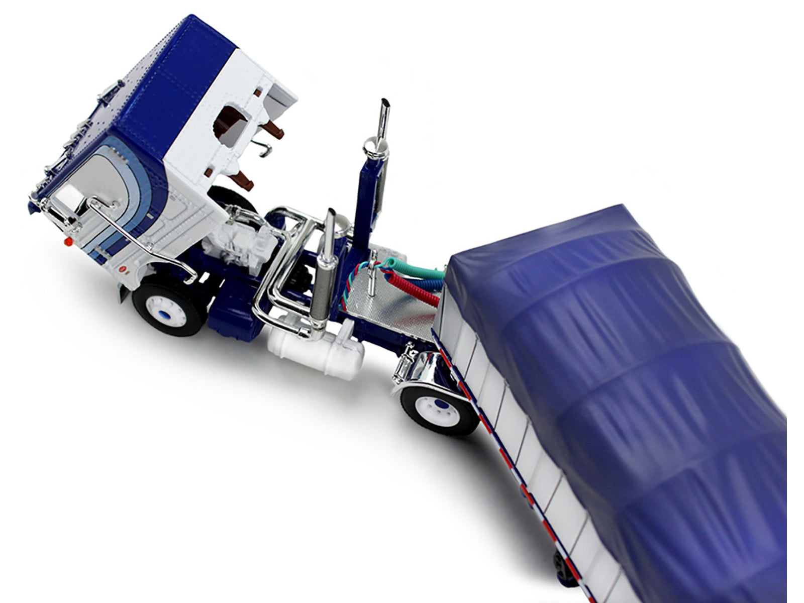 Peterbilt 352 COE 110" Sleeper and 53â€™ Wilson Roadbrute Flatbed Trailer with Covered Wagon White with Blue Stripes 1/64 Diecast Model by DCP/First Gear